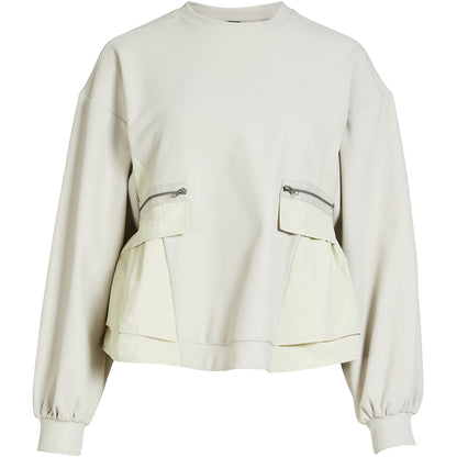 langærmet hvid bluse med ribbet struktur, sænkede skuldre lynlåslommer foran og en let markeret talje. NÜ Zinne Blouse Bone