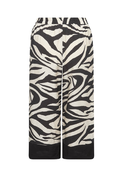 bagpå bukser med zebraprint og brede sorte kante spå buksebenene. Wasabi WA-LUANA 3 Bukser Black Combi