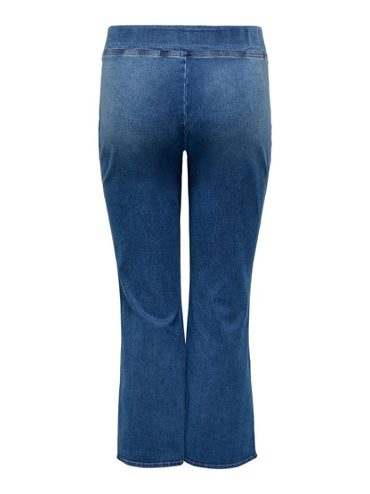 bagpå blå jeans med bred elastik i taljen. ONLY Carmakoma CARROYAL Flared Legging Medium Blue Denim