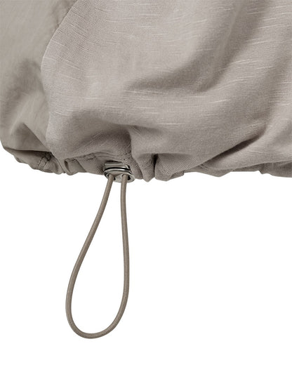 snøre i bunden på kortærmet beige bluse